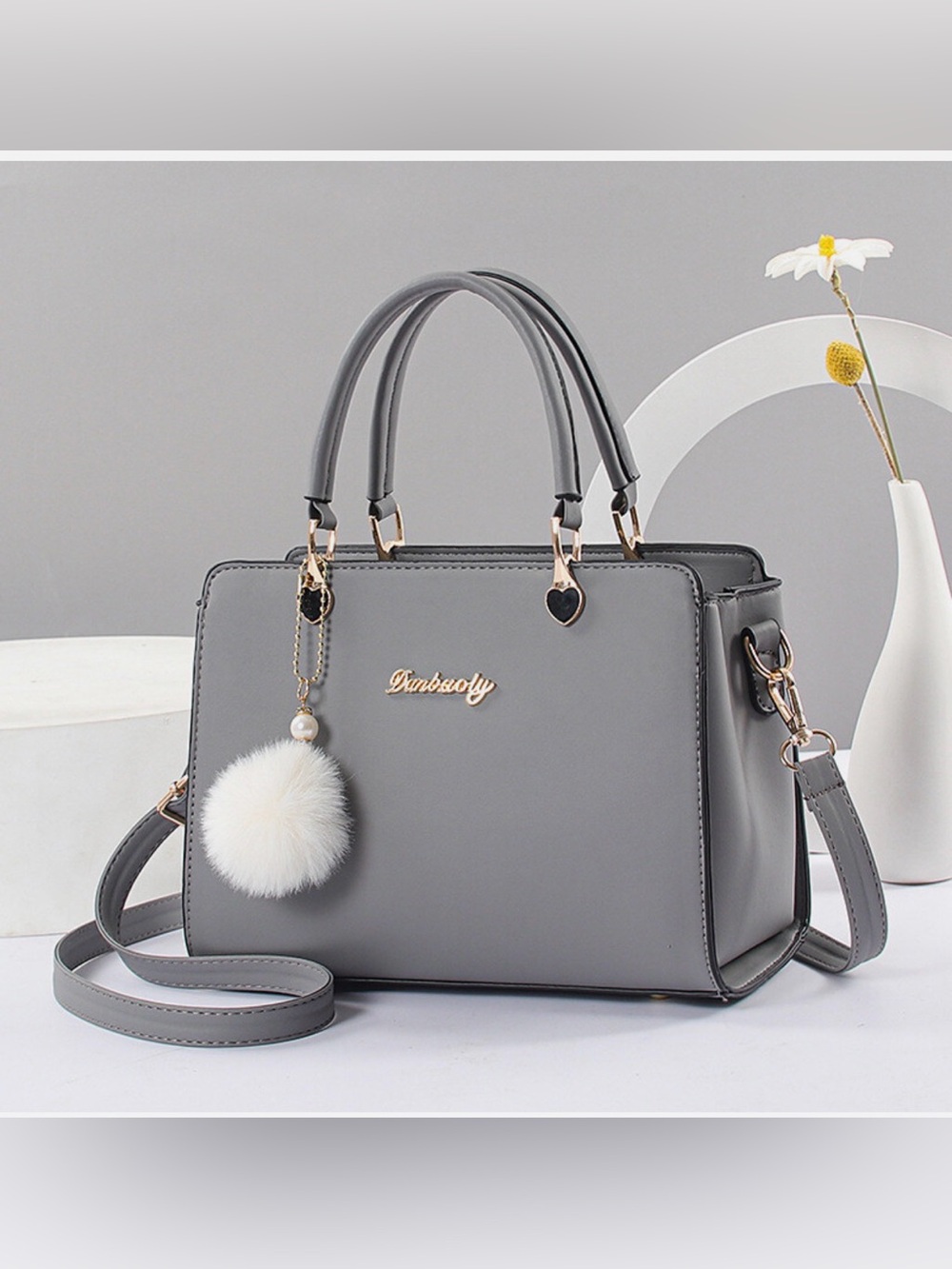 Gray Structured Top-Handle Bag with Pom Pom
